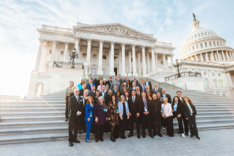 NAMM member delegates pose on the D.C. Capitol Steps